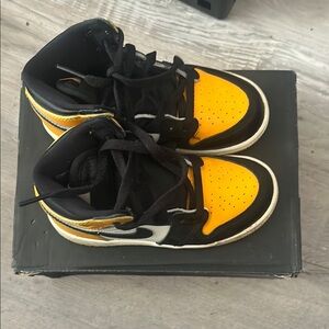 Kids Black and Yellow Jordan 1 Retro Low